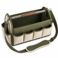 Sac à outils vert et beige avec poignée en métal et bandoulière ajustable
